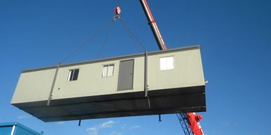 PPW Trading Portable building lifted into place by crane