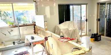 house in progress. construction site. men at work. a house getting renovated 2024 construction site.