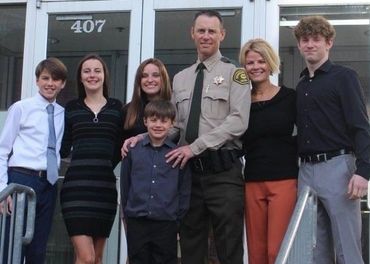 Sheriff Sheehan with his family outside the Law Enforcement Center on the day he was sworn in.