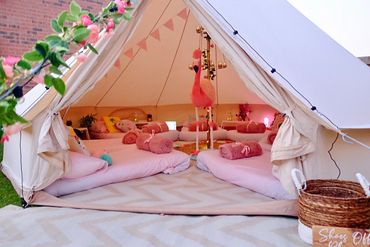 Tropical sleepover party set up in bell tent in garden for outdoor sleepover party in Burton Joyce