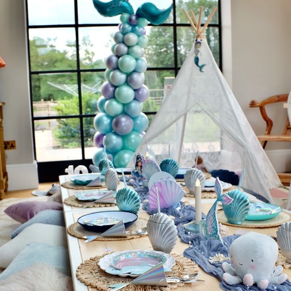 Indoor picnic party with mermaid themed décor and teepee.
