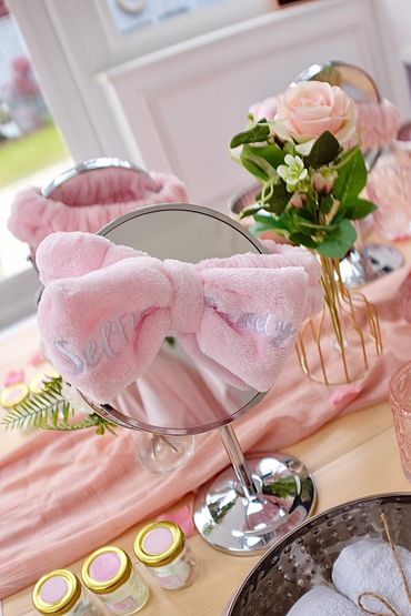 Spa headbands and roses at glam stations.