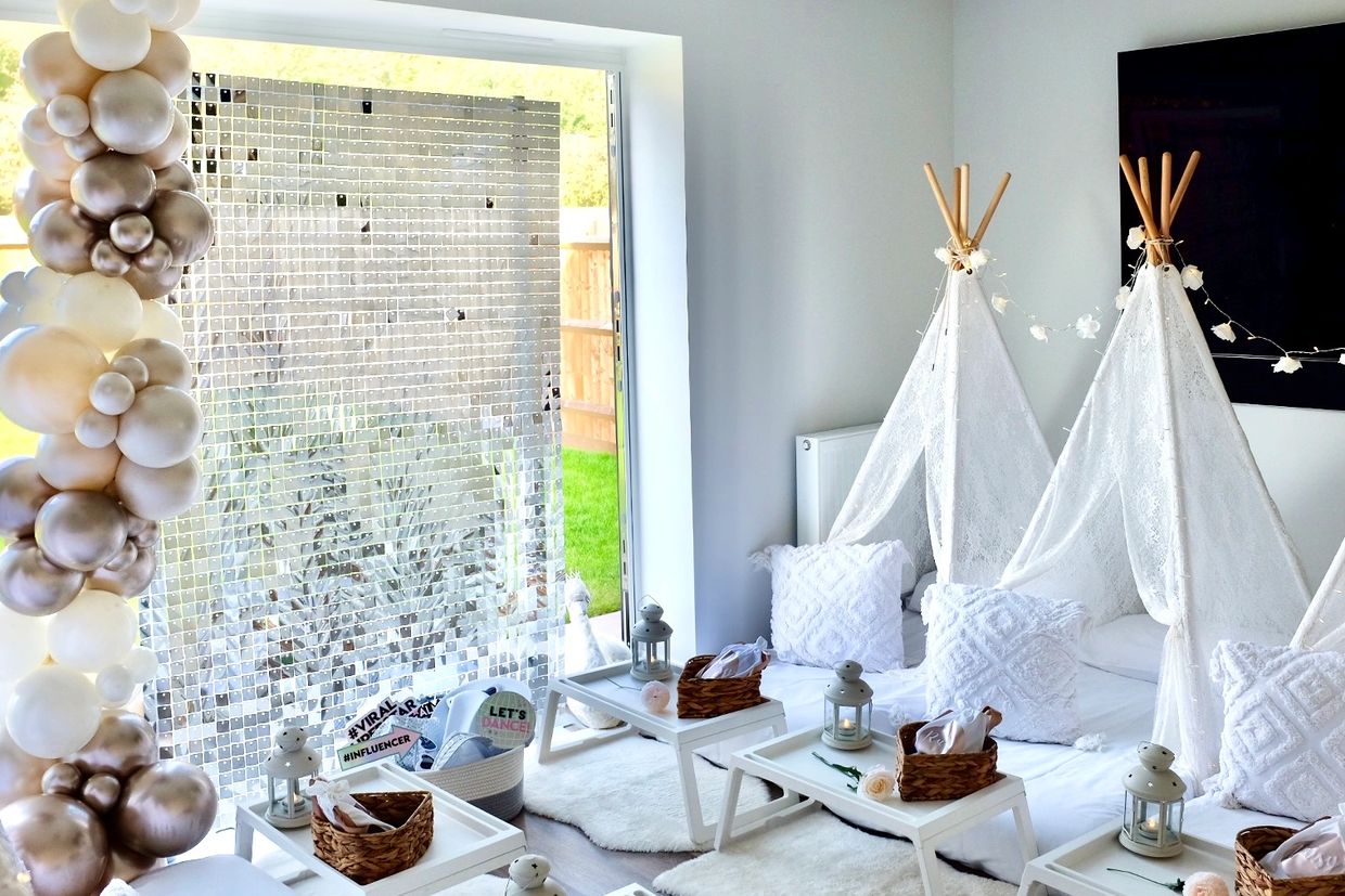 Slumber Buddiezzz Boho white luxury teepee sleepover setup with shimmer wall and balloons ib