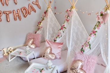 Pink and rose gold luxury sleepover party setup with teepees in Chellaston, Derbyshire.