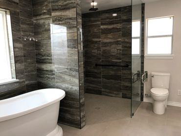 VA Bathroom with large shower allowing wheelchair access.
