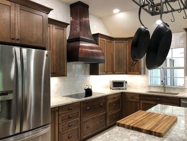 Kitchen Remodeling Company Atlanta GA  picture showing a closer look of the pots and vent hood.