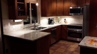 Probuild Creations Kitchen Remodel Brookhaven GA picture of completed project with new wood cabinets