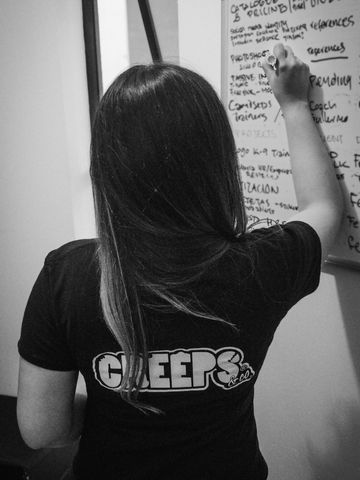 Ebee ortez Graphic designer planing with a custom graphic shirt, Evelyn Ortez planificando