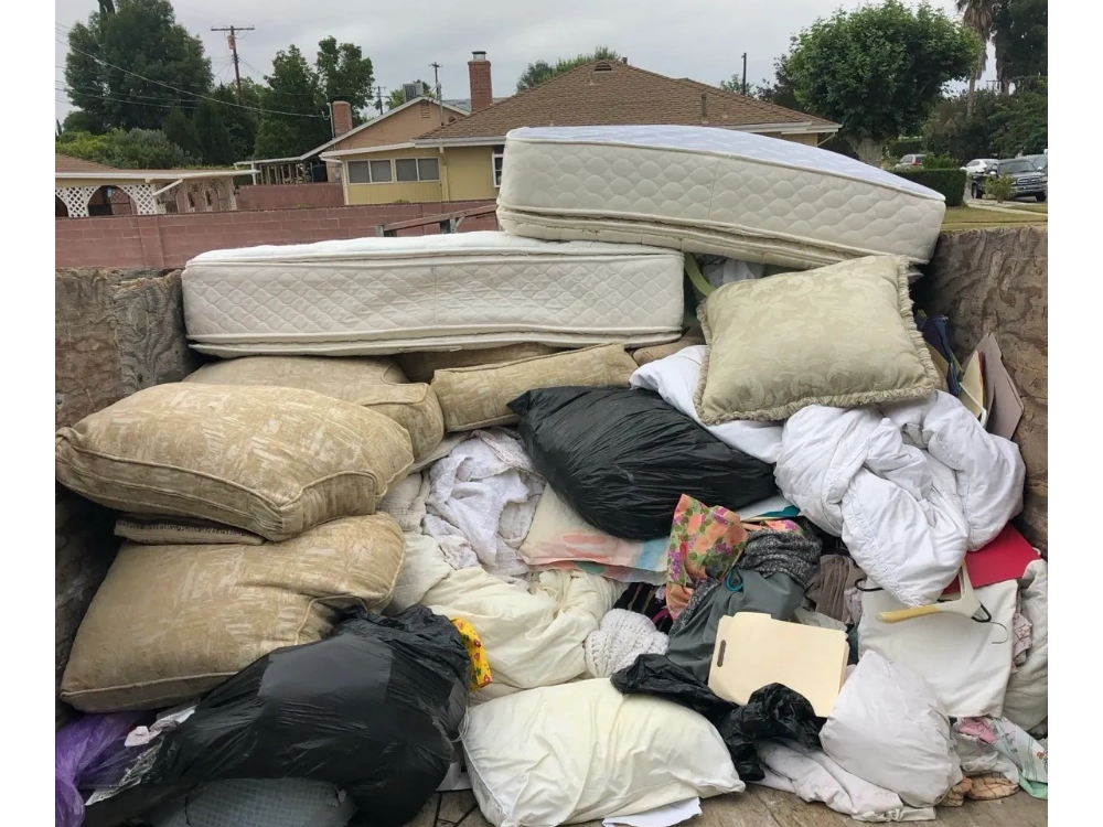 Furniture and mattress removal job by Perez Hauling in Orange County, California
