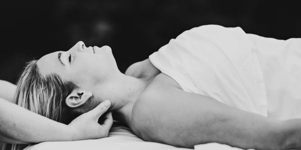 Client relaxing while receiving Therapeutic Massage.
