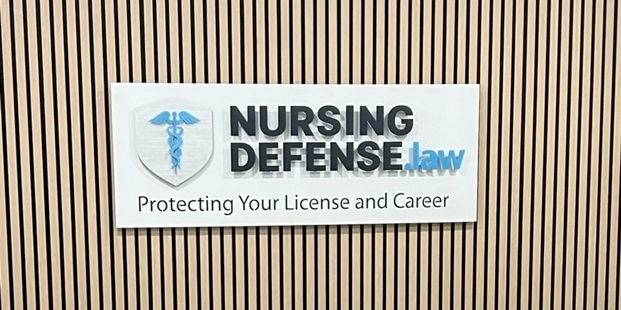 Nursing Defense law sign protecting licenses and careers.