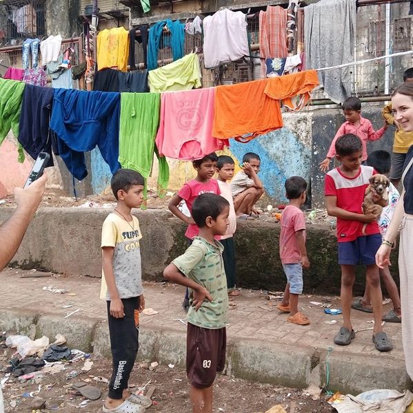 our guest taking picture on Mumbai tour of Dharavi
