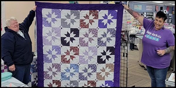 This is what quilting success looks like at PiecedPerfection! Pride and Joy!