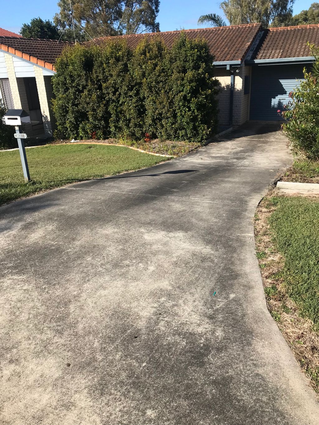 Before photo of a Driveway pressure clean 