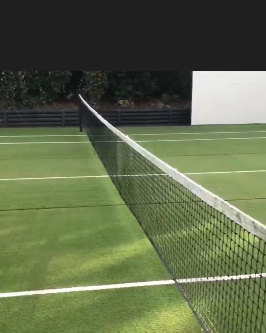 finished result of pressure cleaning of tennis court 