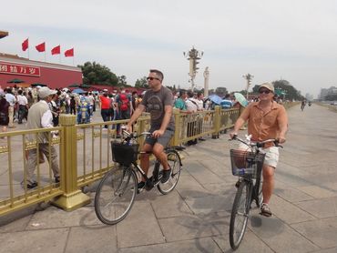 BIKING THROUGH TIANANMEN SQUARE, BEIJING