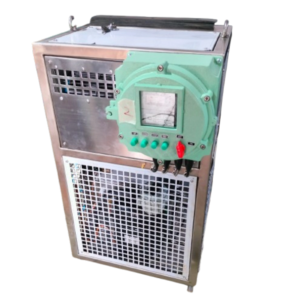 Industrial electronic device with control panel and ventilation grille.