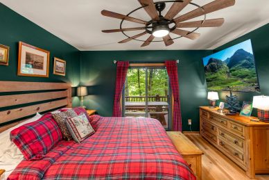 Cozy bedroom with dark green walls