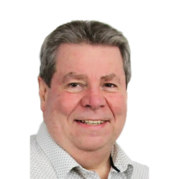 Smiling older man with gray hair.