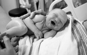 Newborn crying after birth
