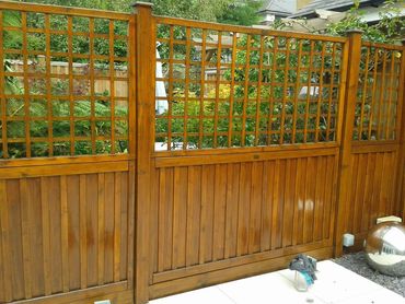 Exterior decorating, garden fence. Completed by Paul Jull decorating - painter and decorator Kent 