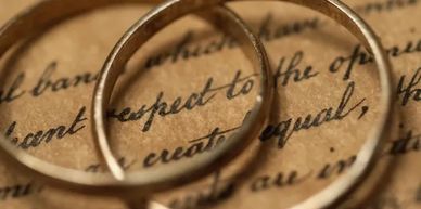 Couple rings on top of a paper