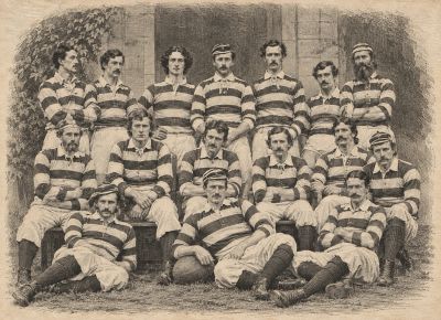 Vintage rugby team portrait with striped jerseys.