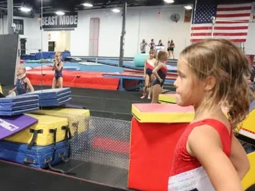 young children doing gymnastics