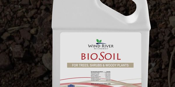 Container of BioSoil fertilizer for trees, shrubs, and woody plants.