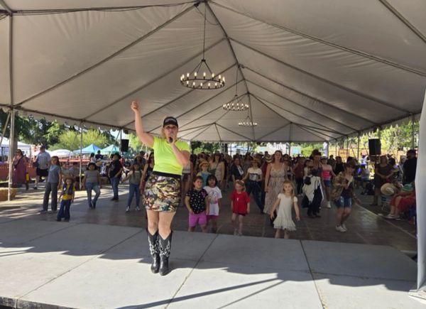 Kristin (Dancin Boss) teaching Dashas new dance Austin at the SCV Ca Cowboy Festival 2024