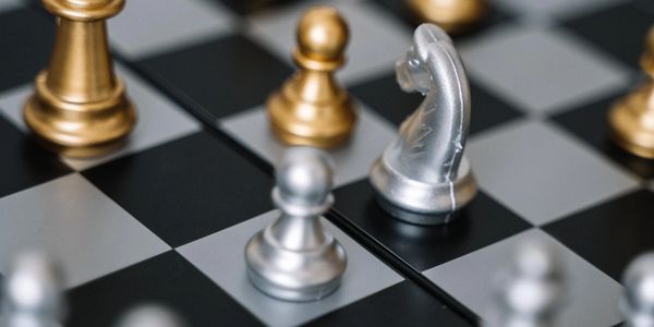 Chess pieces on a board representing business strategy