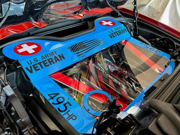 Engine cover with U.S. Army Veteran tribute and 495 horsepower decal.