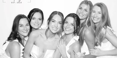 Bride with bridesmaids in a black and white glam picture
