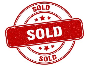 Red rubber stamp with the word SOLD.