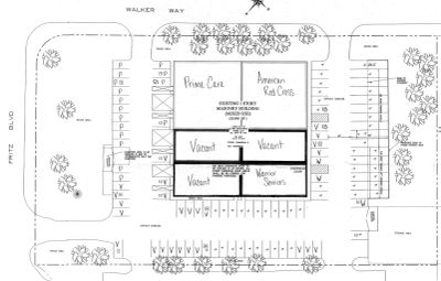 Site plan for a multi-use building with parking and landscaping.