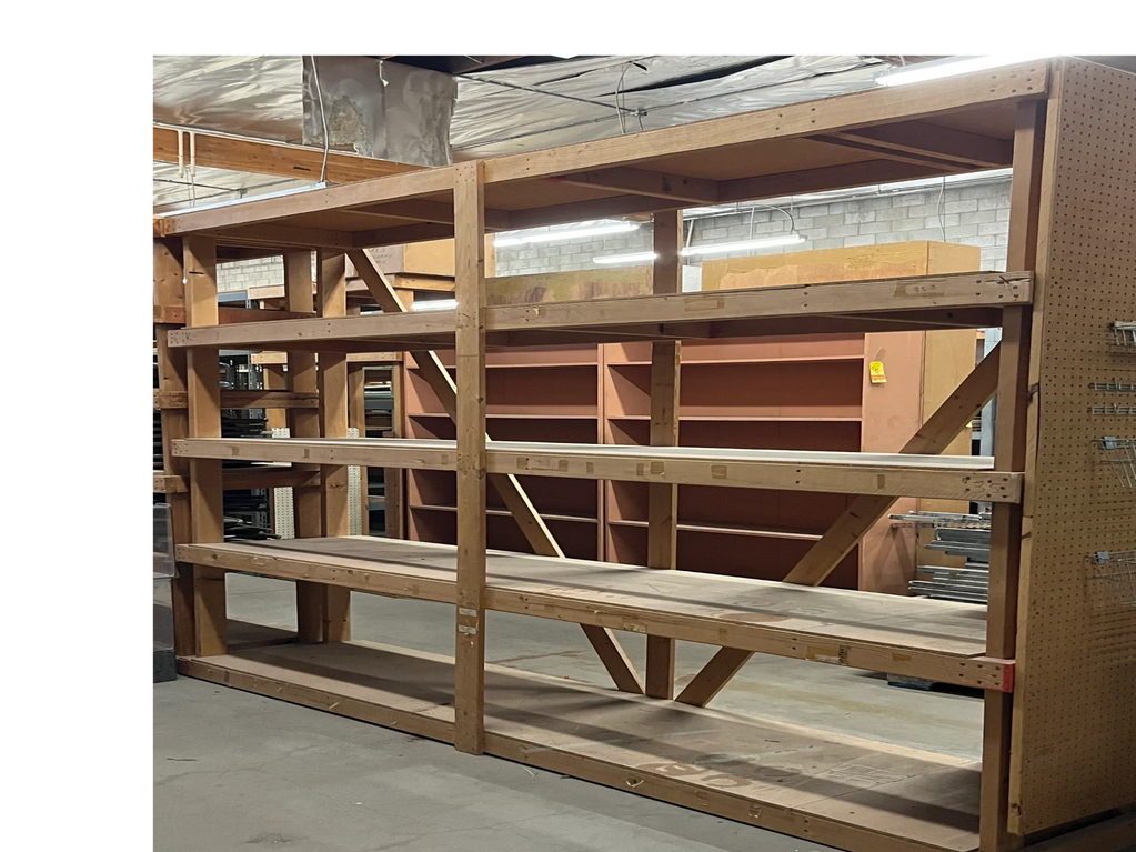 Wooden Shelving for barn, warehouse or shed. Measures: 10' long x 8' tall x 2' deep