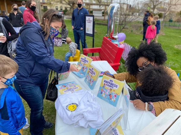 Author signing a book