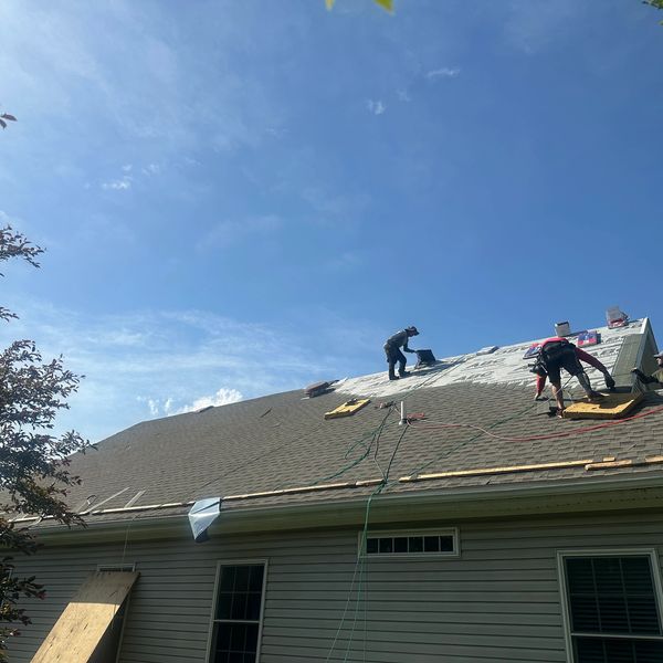 Skilled carpenter building wooden decks in Macungie, PA.