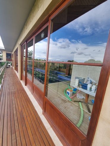Cedar timber doors - repaired and painted after hail damage - penrith
