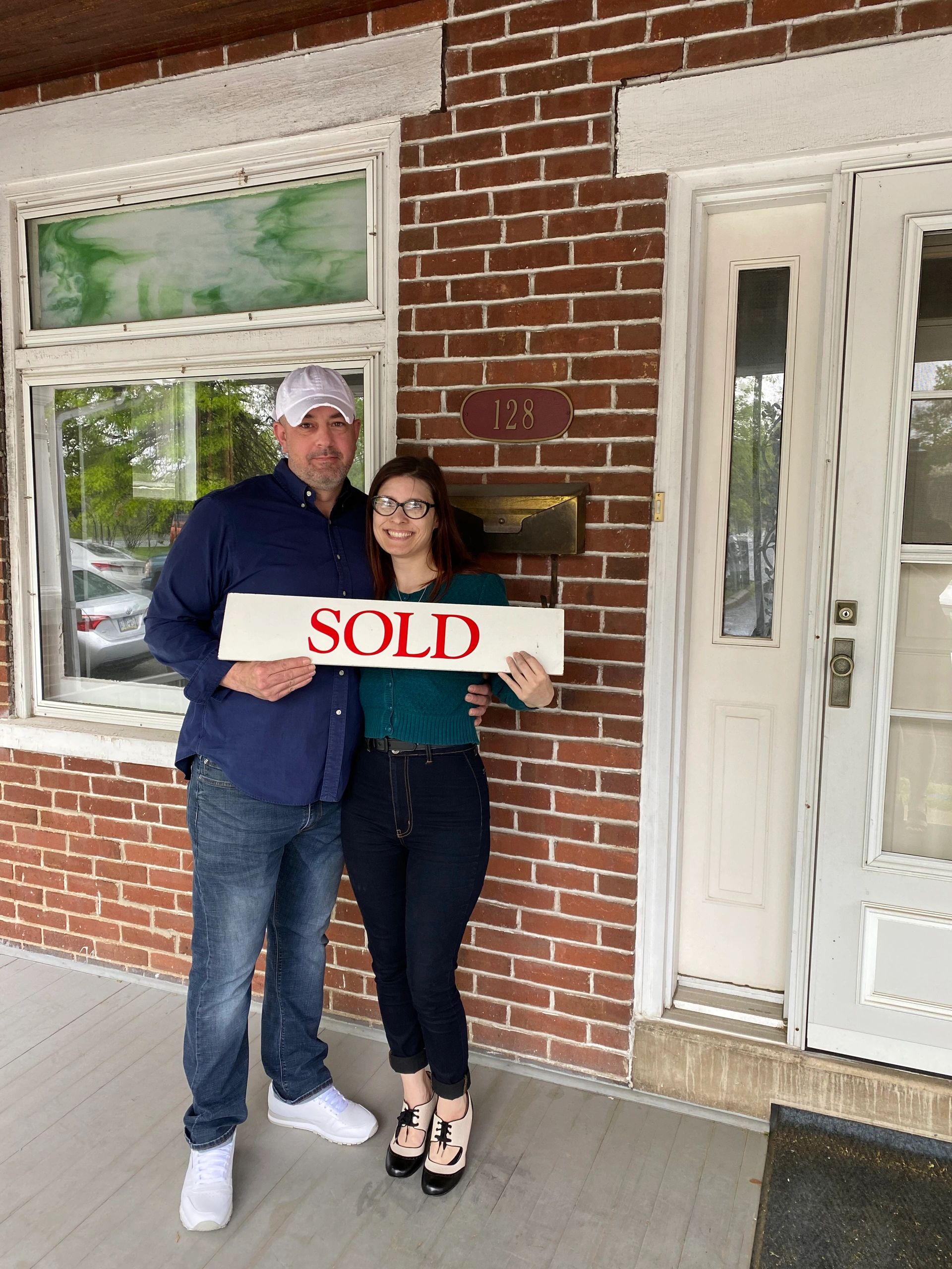 happy couple sold real estate investor realtor home improvements Lehigh Valley home ownership buy 