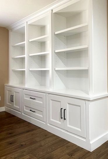 custom bookshelf with adjustable shelves and storage