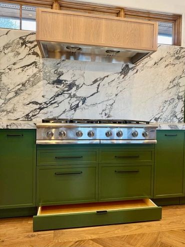 custom kitchen with white oak stove hood