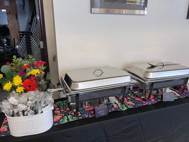 Catering setup - rice & beans in warmers.