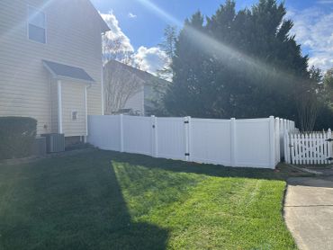 White vinyl fence backyard