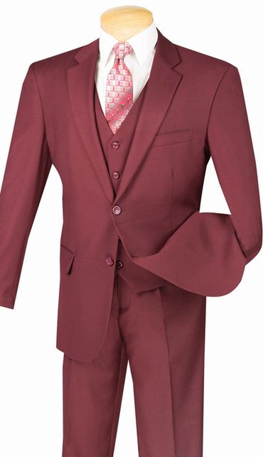 red suit with pink tie