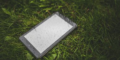 tablet laying in the grass