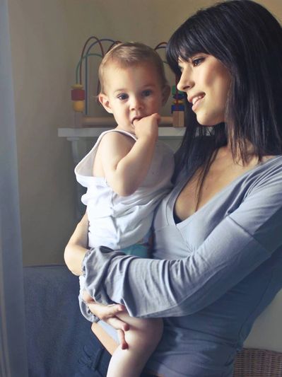 mother recovering from parental burnout and hugging her child