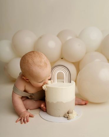 baby eating cake smash cake