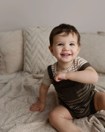 smiling baby boy at first birthday session