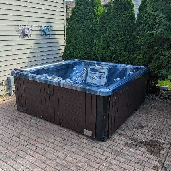 Hot tub removal in Menasha 54952 by Keep'er Movin' Junk Removal and Demolition from the Fox Cities.